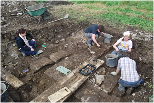 The corner buttress being excavated in 2011.