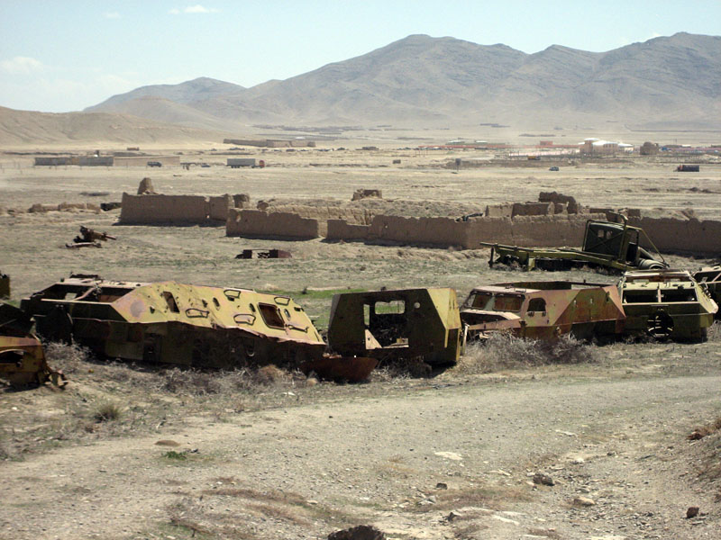 Abandoned Soviet tanks littering the area in front of the palace of Ma'sud III (early 12th c. A.D.), Ghazni