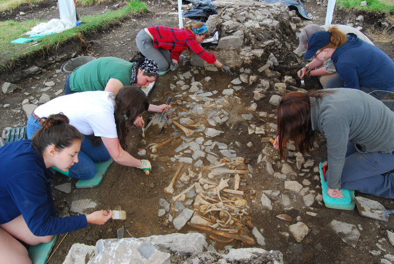 Students excavating human remains at the Blackfriary site