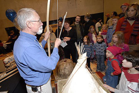 Exhibitor demonstrates bow-and-arrow at the 2009 Archaeology Fair.