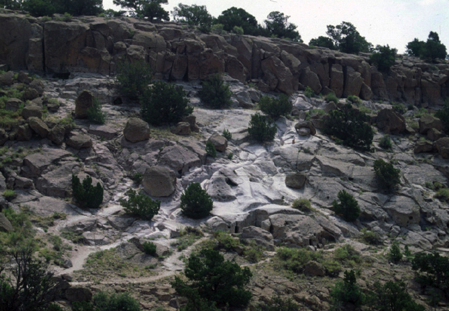 Figure 1. Landscape erosion from uncontrolled visitation at Tsankawi, Bandelier National Monument.