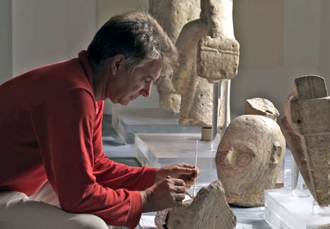 AIA Lecturer Roberto Nardi at work conserving ancient sculptures