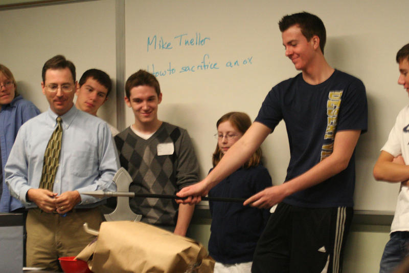 Students at Apples + Archaeology learn how to sacrifice an ox (photo courtesy AIA Central Arizona Society)