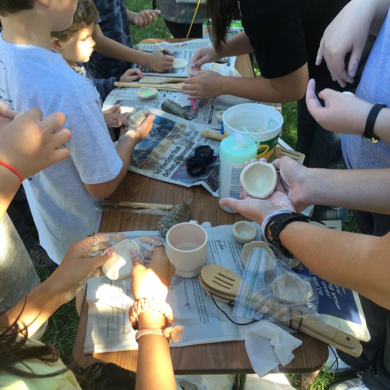 Participants making pots at an event organized by the AIA Local Society in Greensboro, North Carolina, supported by a Local Society Outreach Grant