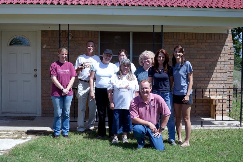 Teacher's workshop participants outside the Gault School of Archaeological Research (GSAR)'s fieldhouse.  D. Clark Wernecke (GSAR Executive Director) in front