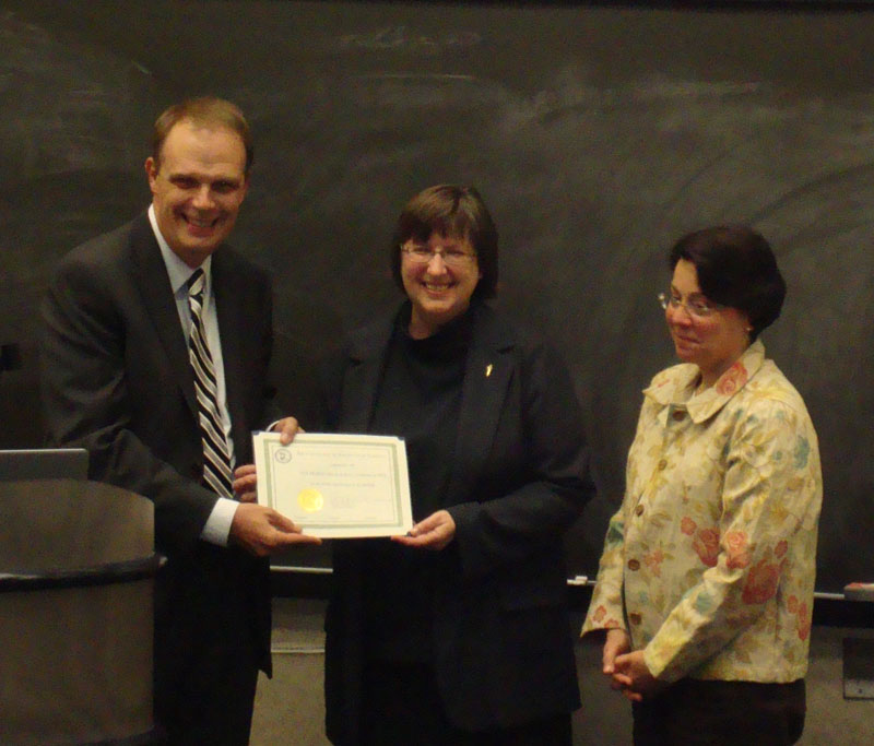 AIA’s CEO Peter Herdrich congratulates Hartford Society President Martha Risser (center) and Secretary-Treasurer Karen Menko on the Hartford Society’s 100th year.