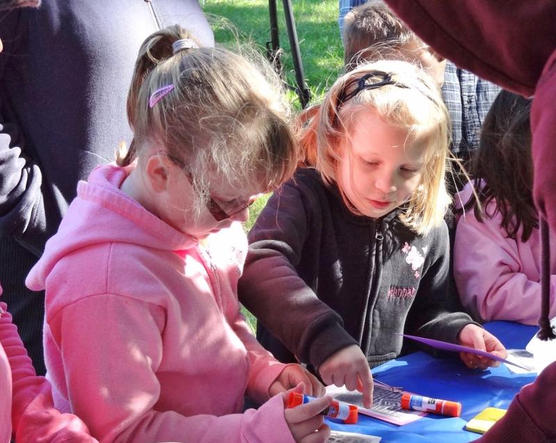 Elizabeth Crawford and Hannah Preus participate in one of the many craft activities.