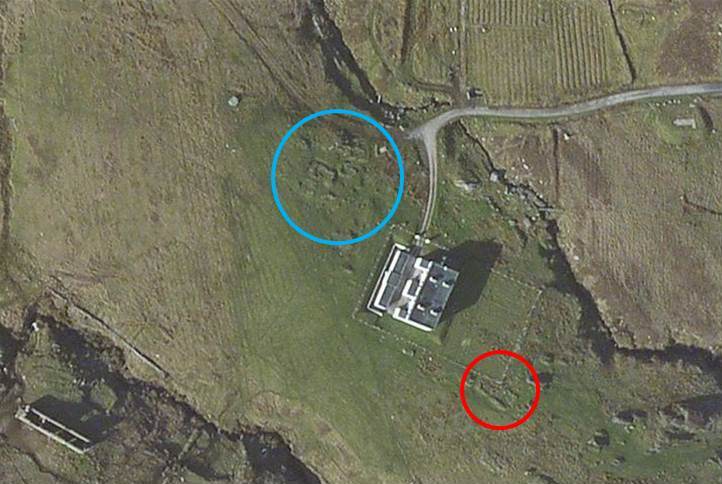 In this aerial shot the coast guard station is shown in the centre, the main part of the settlement is shown inside the blue circle, and the rectangular enclosure is shown inside the red circle. The long building at the bottom left is thought to be a granary associated with Boycott’s farm that was established in the 1850’s, although this has not yet been proven definitively.