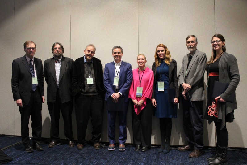 AIA award winners (from left), Ian Hodder, A. Mark Pollard, James Packer, Eric Poehler, AIA President Jodi Magness,
Chelsea Gardner, Robert Kelly, and Laure Marest-Caffey