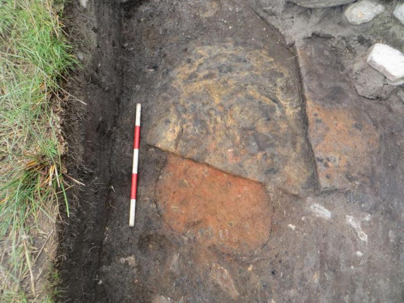The three overlying hearths in the centre of the ovoid building during excavation. The first charcoal sample came from the middle hearth in the sequence, clearly identifiable through its distinctive yellow colour.