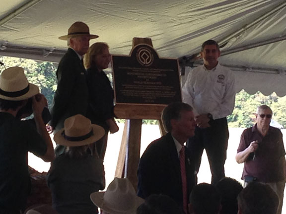 Jay Dardenne (Lt. Governor of Louisiana), Mary Landrieu (US Senator), and Jonathan Jarvis (Director of the National Park Service) unveil Poverty Point's UNESCO plaque (courtesy of the Lousiana Division of Archaeology)