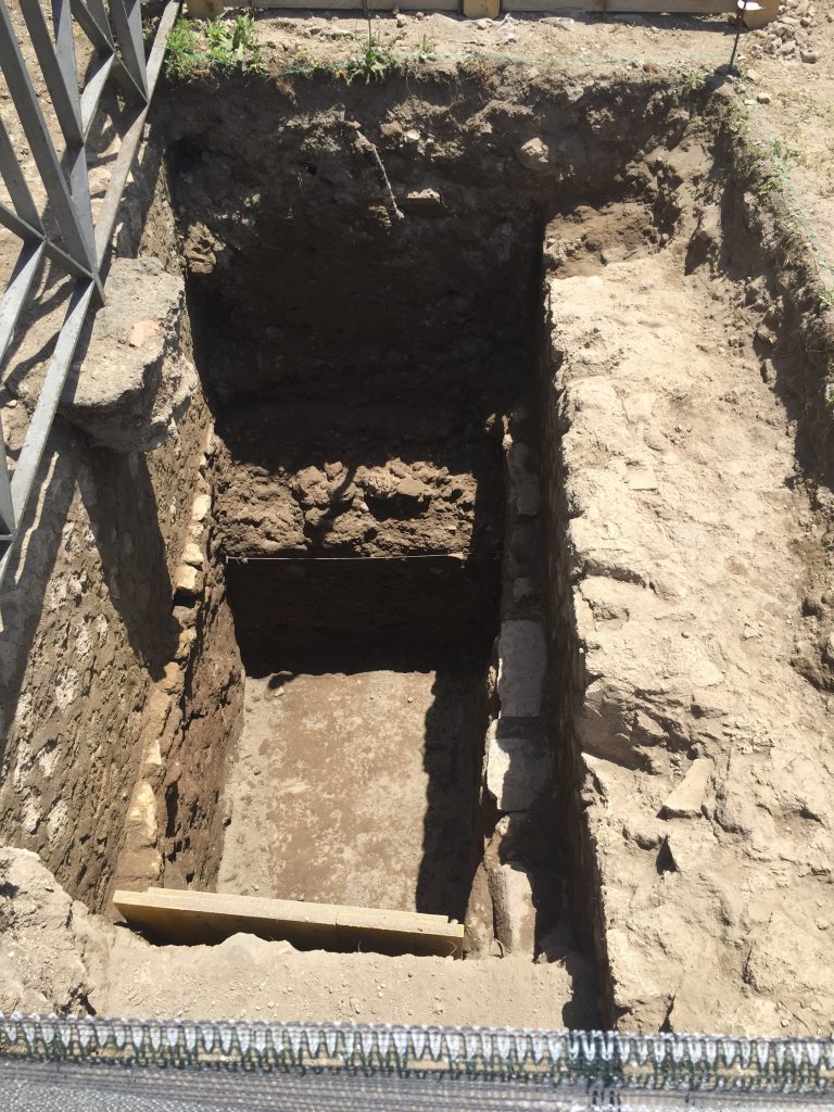 Figure 5: Trench I: sounding from Curti’s 2004 excavations in the northeast corner of the sanctuary (note the string on the south section, originally used to attach a measuring tape for drawing).