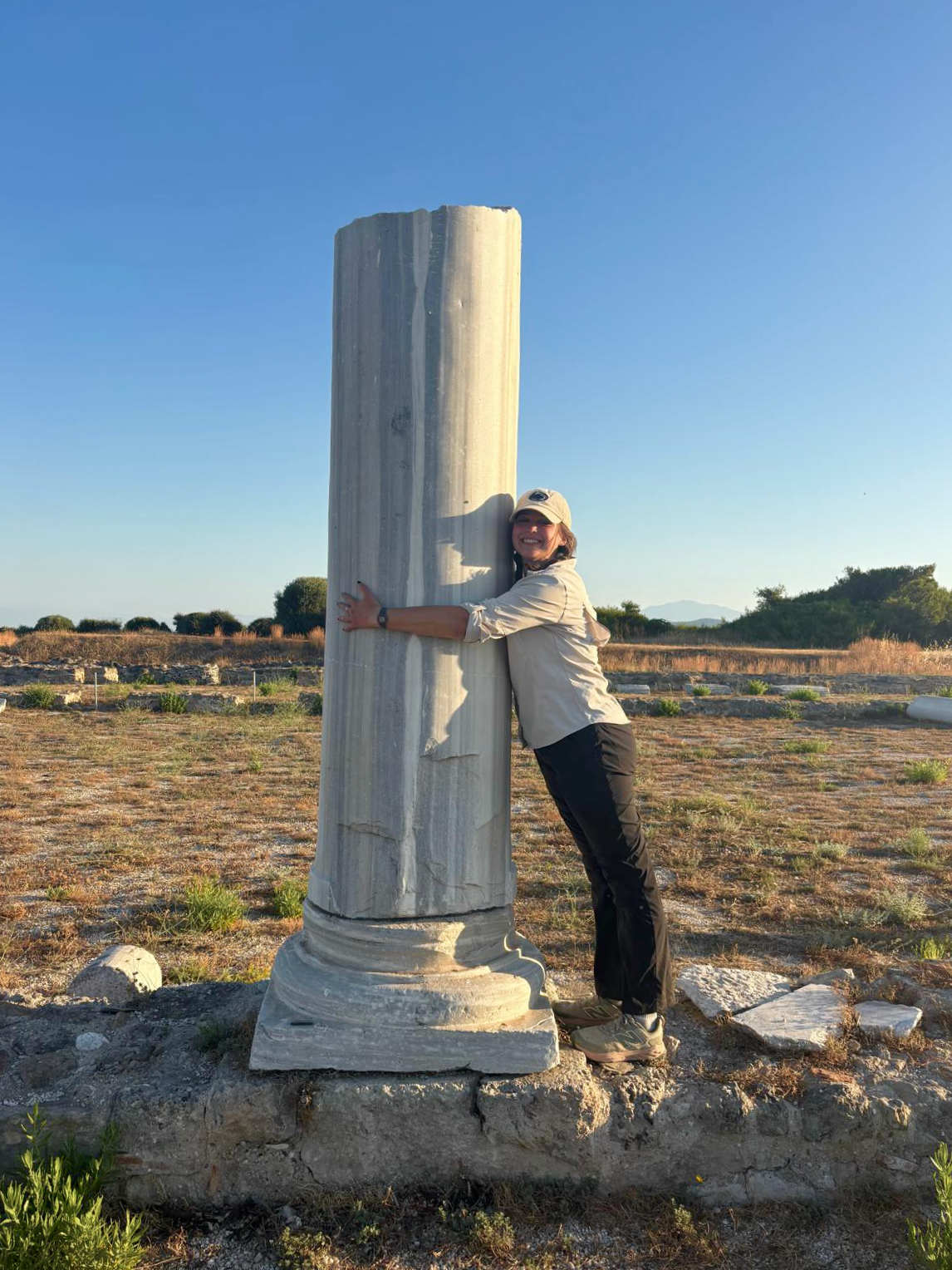Corinth, Greece, Marie Gruver hugging a column, Lechaion Basilica